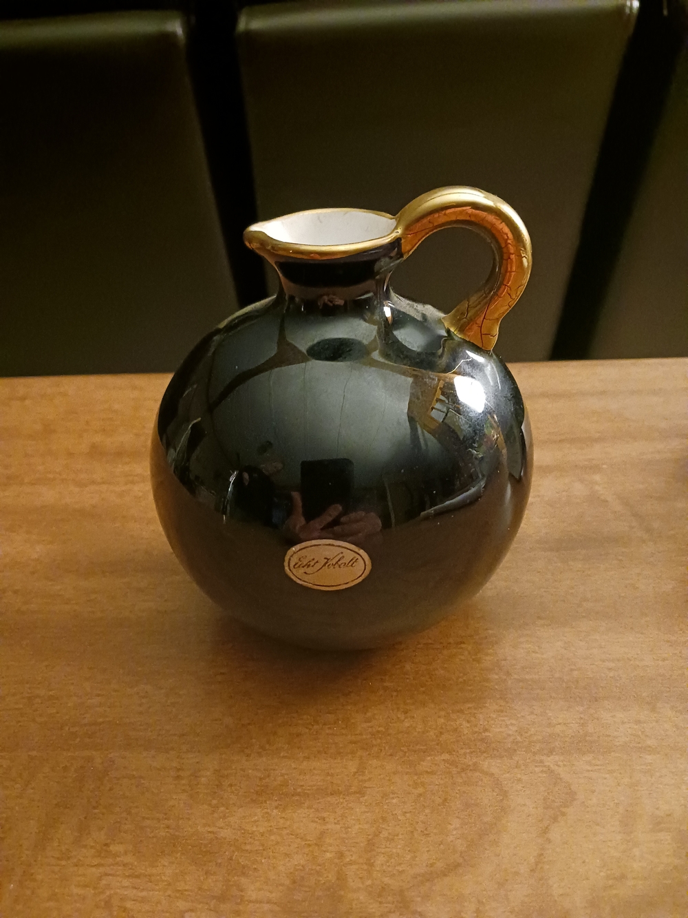 Glossy Black and Gold Ceramic Pitcher Vase